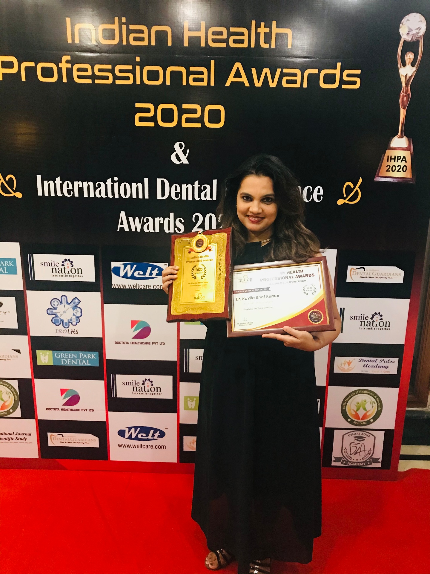 Dr. Kavita Bhat Kumar with Indian Health Professional Awards 2020 plaque and certificate Dr. Kavita Bhat Kumar with Indian Health Professional Awards 2020 plaque and certificate